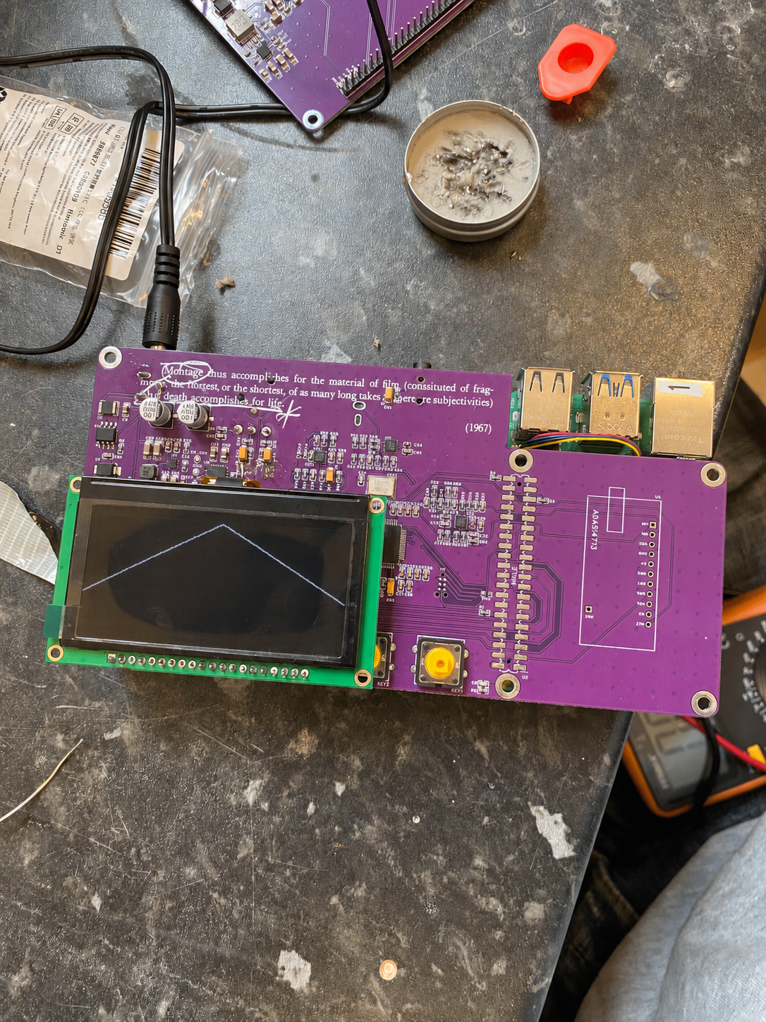 Lichtbogen PCB with display, audio hardware and development bench components.