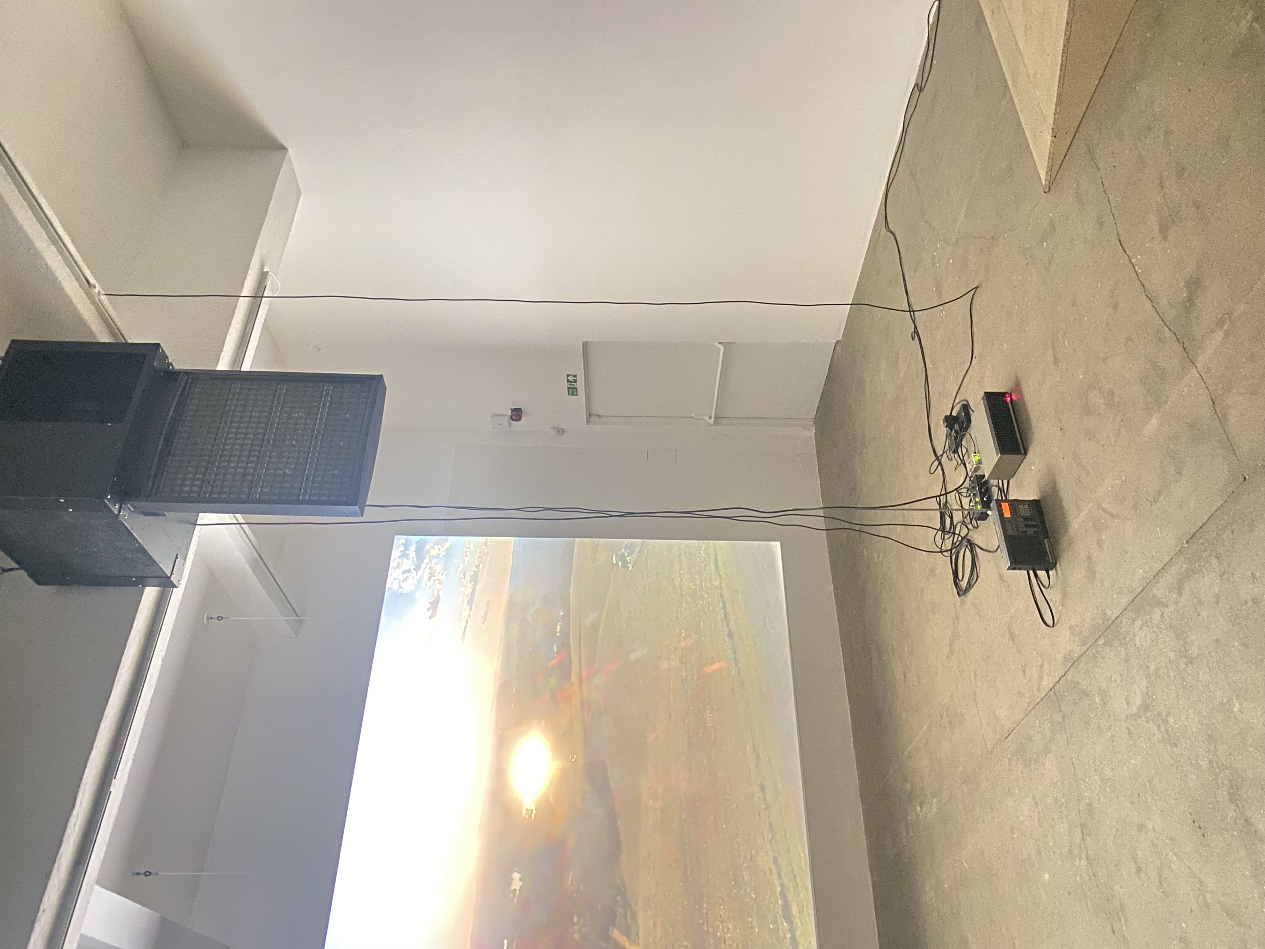 Portrait view of the STILL LIFE suspended hardware, cabling and floor electronics.